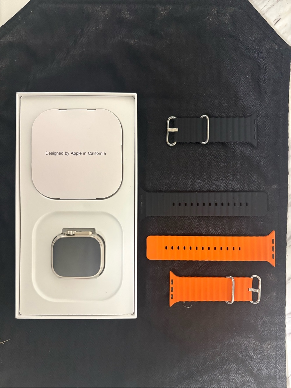 Apple Watch Case with Black and Orange Silicone Bands - Apple